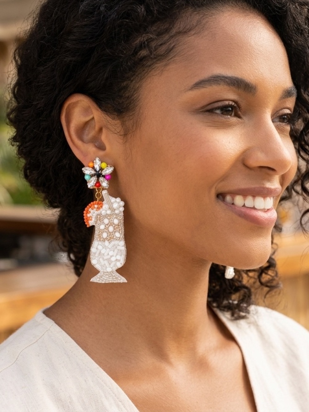 White beaded cocktail earrings